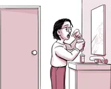 Nia tomando el medicamento en su hogar.
