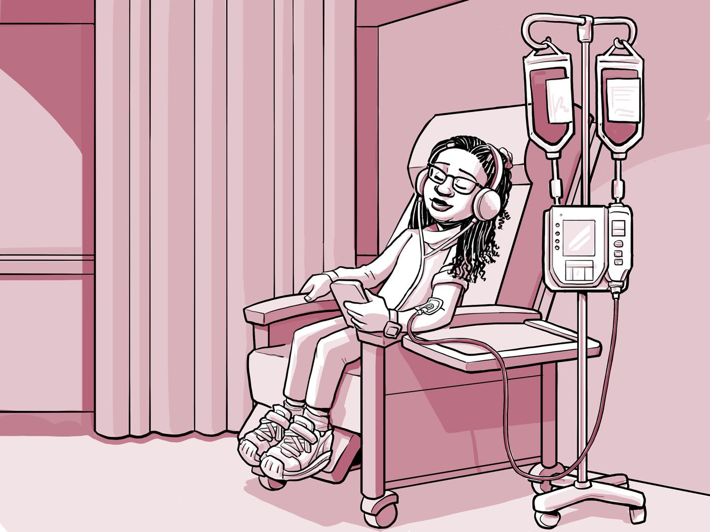 Nia sentada en una silla en el centro de infusión.