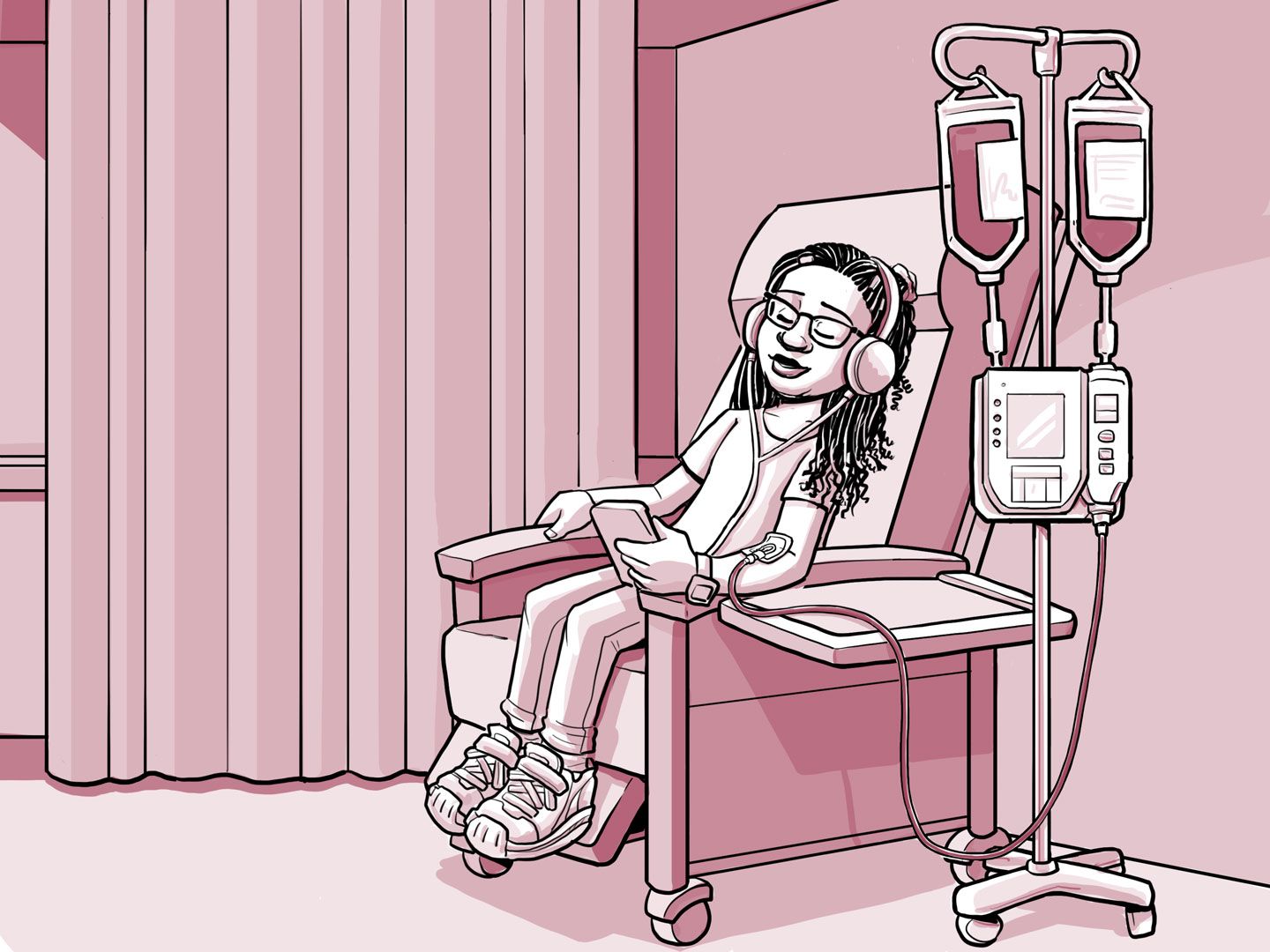 Nia sentada en una silla en el centro de infusión.