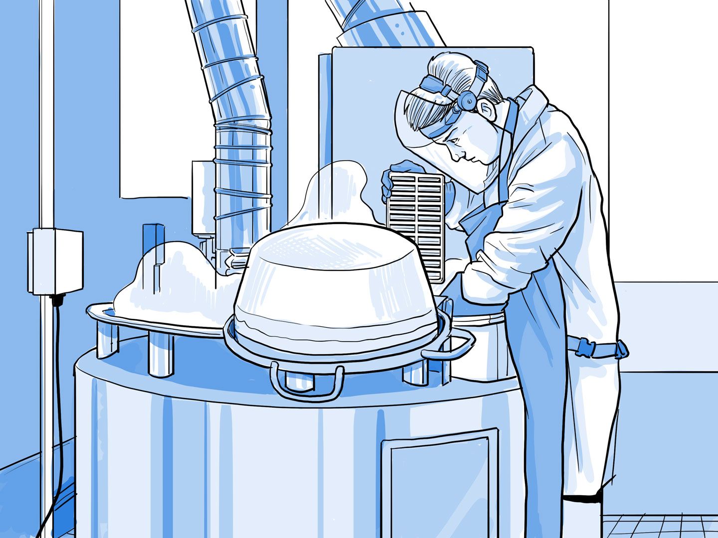 Técnico de laboratorio introduciendo células en el congelador.