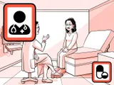 Nia con el nuevo médico en la sala de examen.