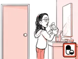 Nia tomando el medicamento en su hogar.