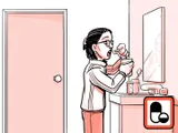 Nia tomando el medicamento en su hogar.