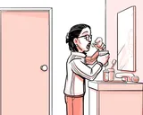 Nia tomando el medicamento en su hogar.